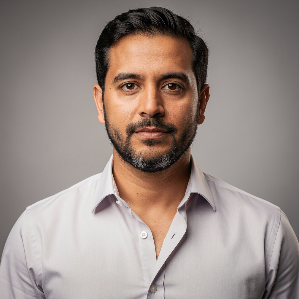 Portrait of a bearded man in a collared shirt