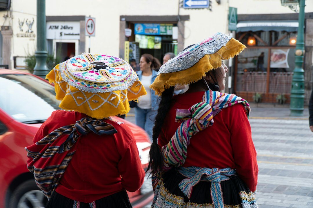 Street market vendors selling produce in a Latin American city